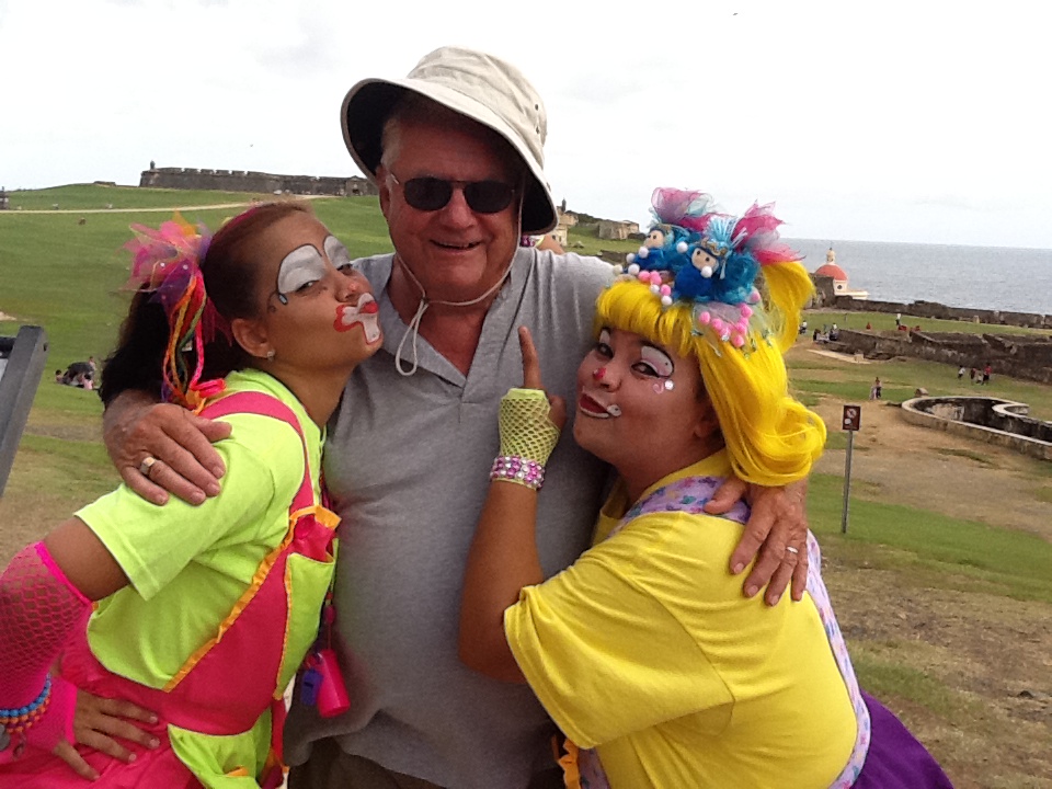 Senior tourist with clowns in Puerto Rico