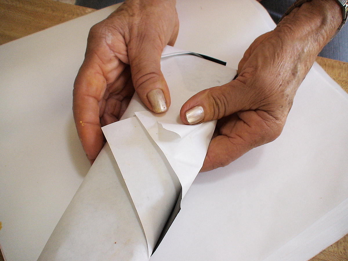 Pasteles wrapped with paper parchment